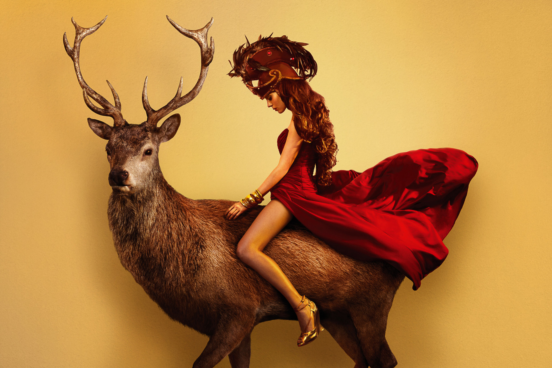 attractive woman riding deer